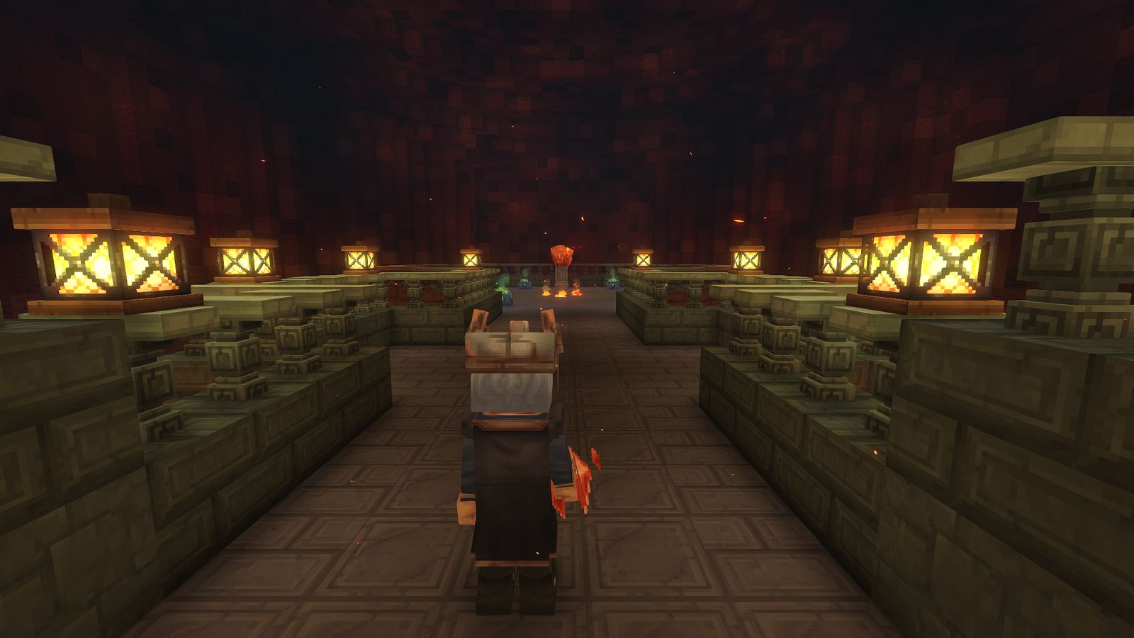 An adventurer walks a lantern-lit causeway between pools of lava towards a glowing chamber